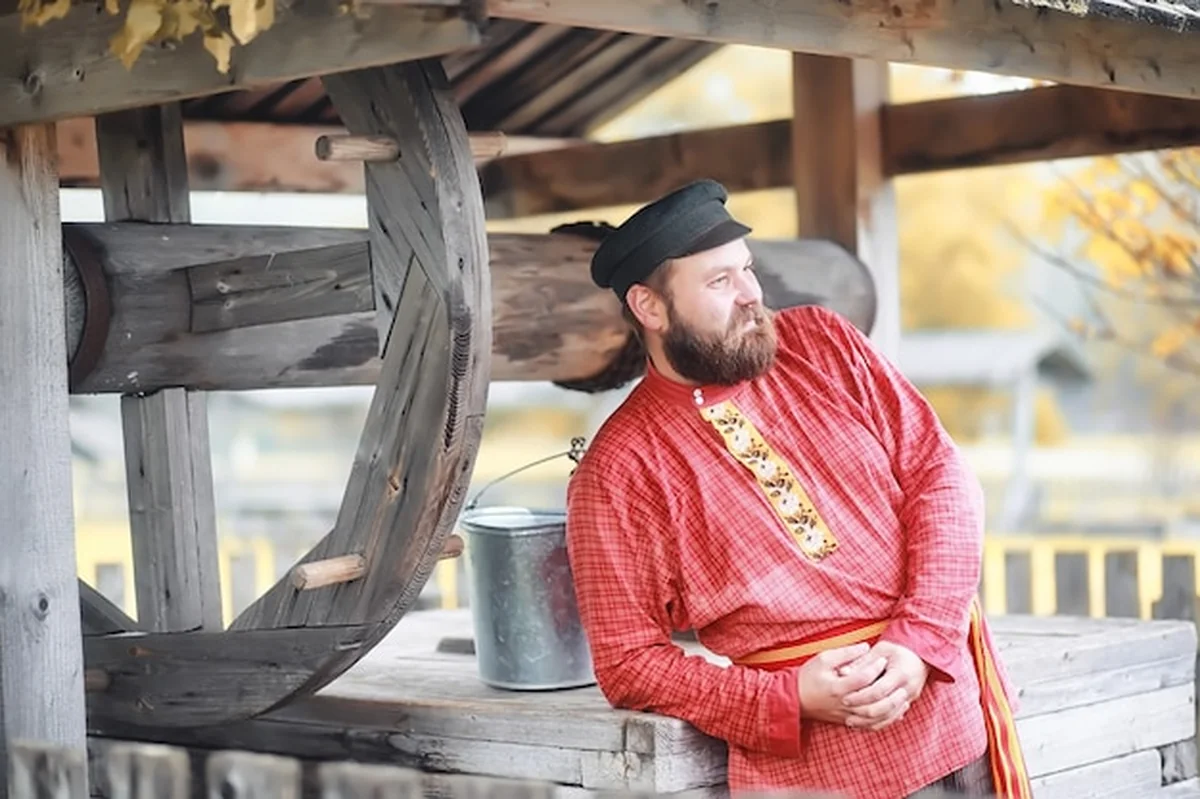 Chłopi w eleganckich szatach na gospodarstwie wiejskim